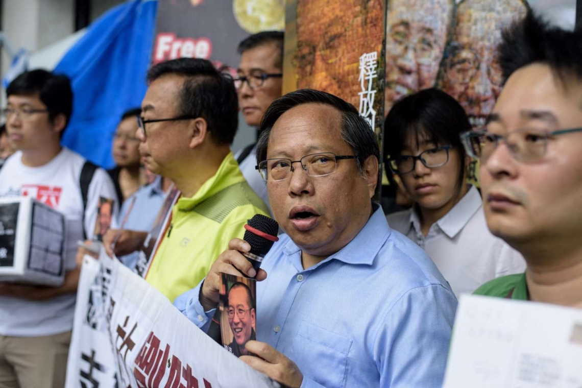Hong Kong: un éminent défenseur des droits arrêté par la police