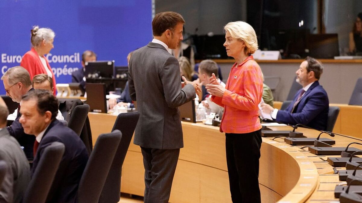 France's President Emmanuel Macron (L) talks with President of the European Commission Ursula von der Leyen ahead of the European Council Summit at the EU headquarters in Brussels on June 27, 2024. (Photo by Ludovic MARIN / AFP)