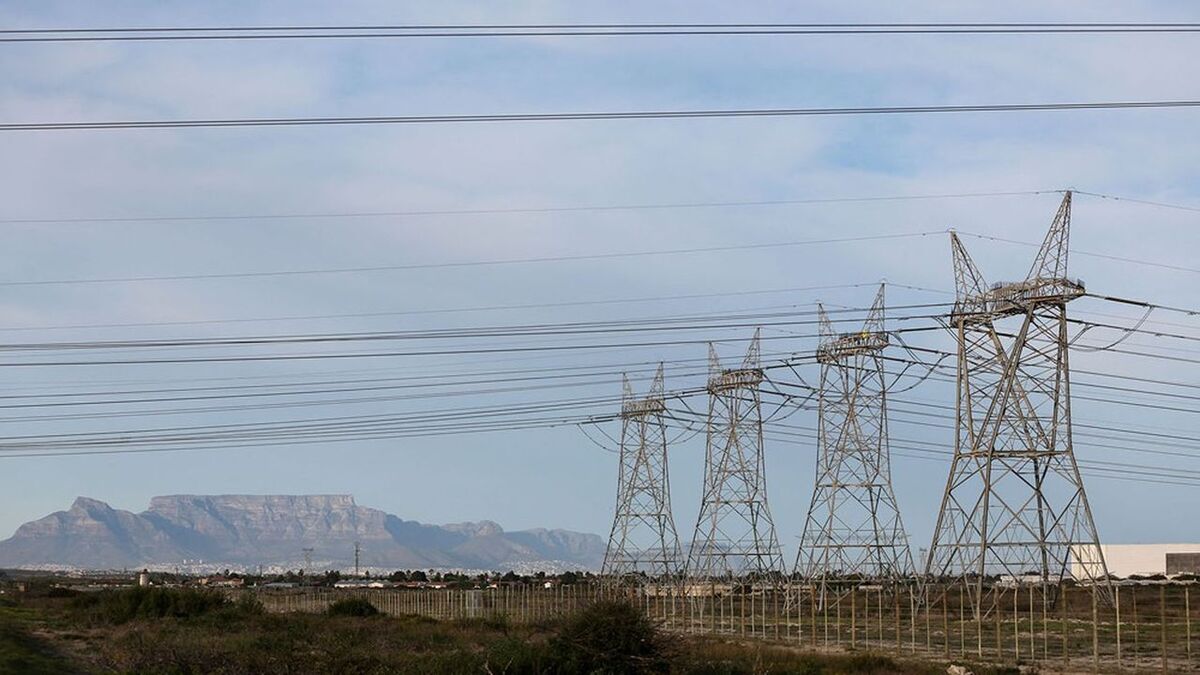 FILE PHOTO: Electricity pylons carrying power from Koeberg nuclear power plant are seen in Cape Town, South Africa July 11, 2018. REUTERS/Sumaya Hisham/File Photo