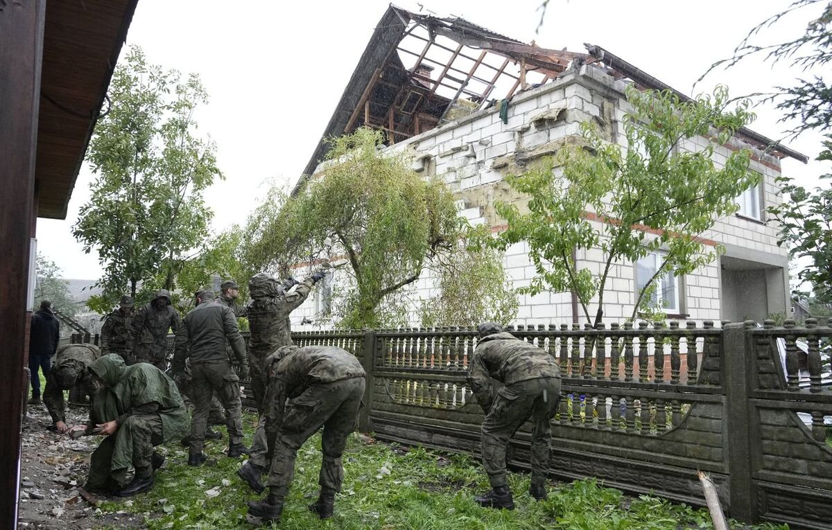 1444x920_territorial-defense-officers-clean-up-debris-from-the-destroyed-roof-of-a-house-after-russian-drones-violated-polish-airspace-during-an-attack-on-ukraine-in-wyryki-near-lublin-poland-thursday-s.jpeg