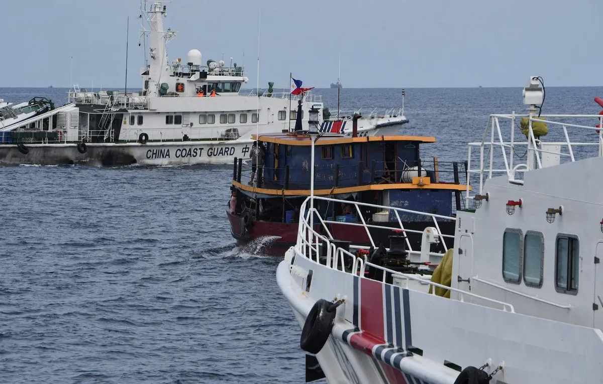 1444x920_files-this-file-photo-taken-on-august-22-2023-shows-chinese-coast-guard-ships-l-and-r-corralling-a-philippine-civilian-boat-chartered-by-the-philippine-navy-to-deliver-supplies-to-the-philippine-navy-ship-br.webp
