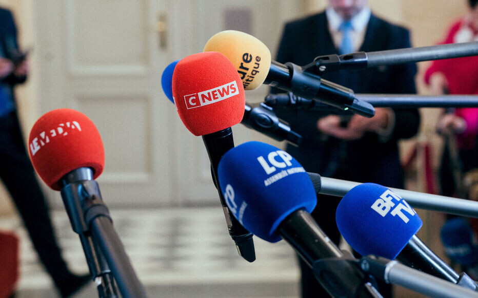 This photo is an illustration of the microphones of several French televisions such as C-news, Bfm tv, LCP ahead a vote on a no-confidence motion against the 49.3 of France's Prime Minister Francois Bayrou to adopt the state budget bill for 2025 without a vote, at the National Assembly, France's lower house parliament, in Paris, France on February 5, 2025 in the room of the 4 columns at the national assembly. Following his use of the 49.3 on the 2025 budget plans, François Bayrou faces two new non-confidence motions on February 5, 2025, both of which are doomed to failure, as the government promises to reform the state and introduce measures of “order and authority” once the budget sequence is over. Photo by Alexis Jumeau/ABACAPRESS.COM