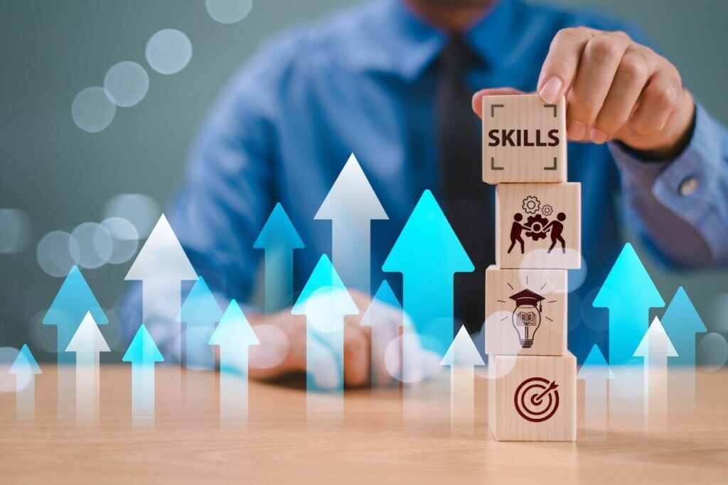 Skill competency development concept. Up new ability skill training for technology evolution. Leadership thinking upskill. Hand hold wooden cube, soft skill digital icon. Education learning talent