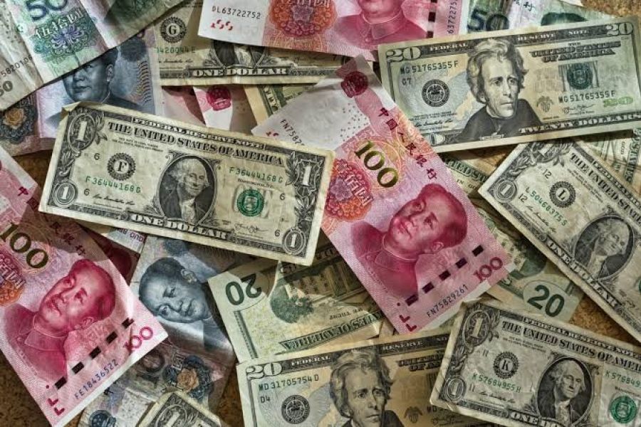 Pression monétaire : La guerre des devises entre le dollar américain et le yuan numérique en Asie